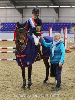 Lucy Capper & Capability Brown win the Scottish Branch JA Indoor Championship at Scottish Horse of the Year Show 2023
